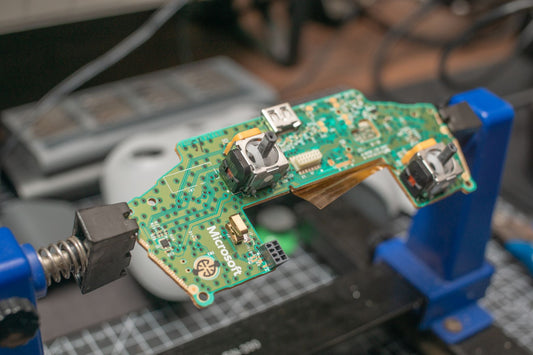Joystick desarmado para reparar drift y botones