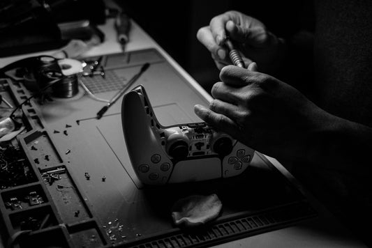 Reparación de consola de videojuegos con microsoldadura